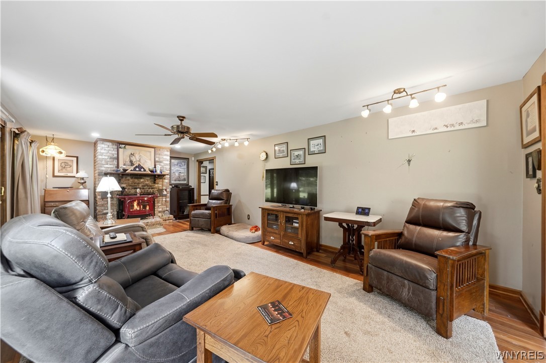 9950 Harper Road Darien, NY 14036 - Photo 35 of 50 Living room with Vermont Castings wood stove