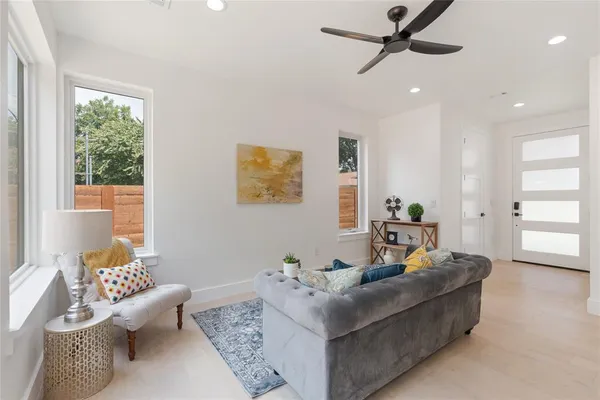 a living room with furniture and a window