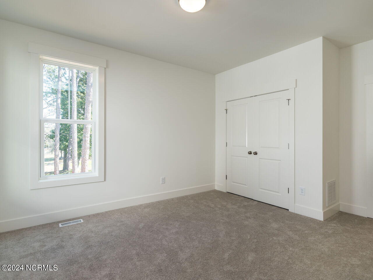 331 Braden Road Southern Pines, NC 28387 - Photo 13 of 29 015-1280x960-first-floor-bedroom