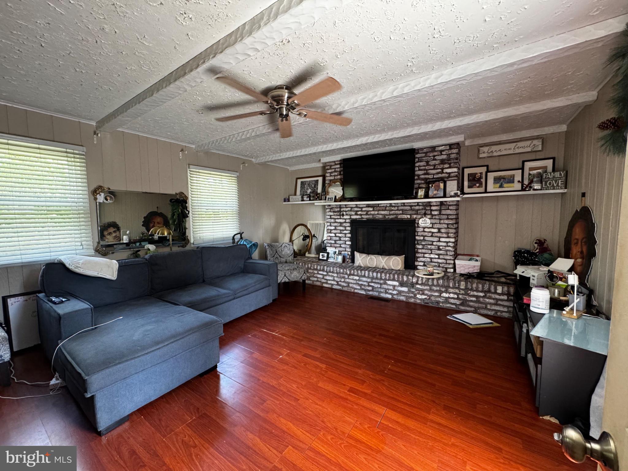 54 Warwick Road Stratford, NJ 08084 - Photo 15 of 20 Cozy living space with warm ambiance.