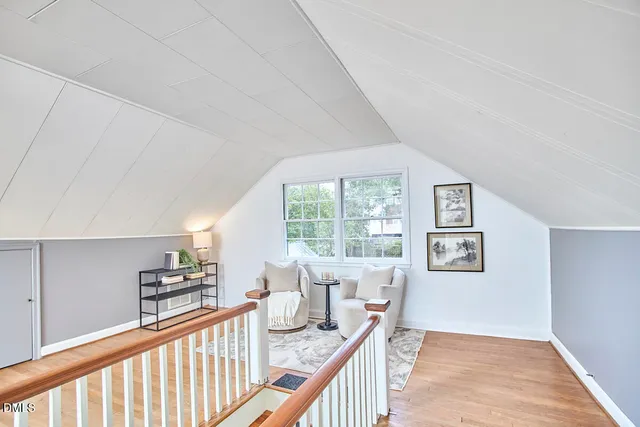 a view of a hallway view with staircase