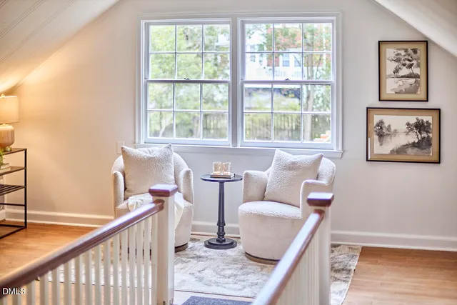 a living room with furniture and windows