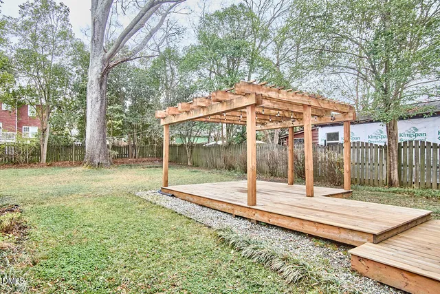 a backyard of a house with lots of green space