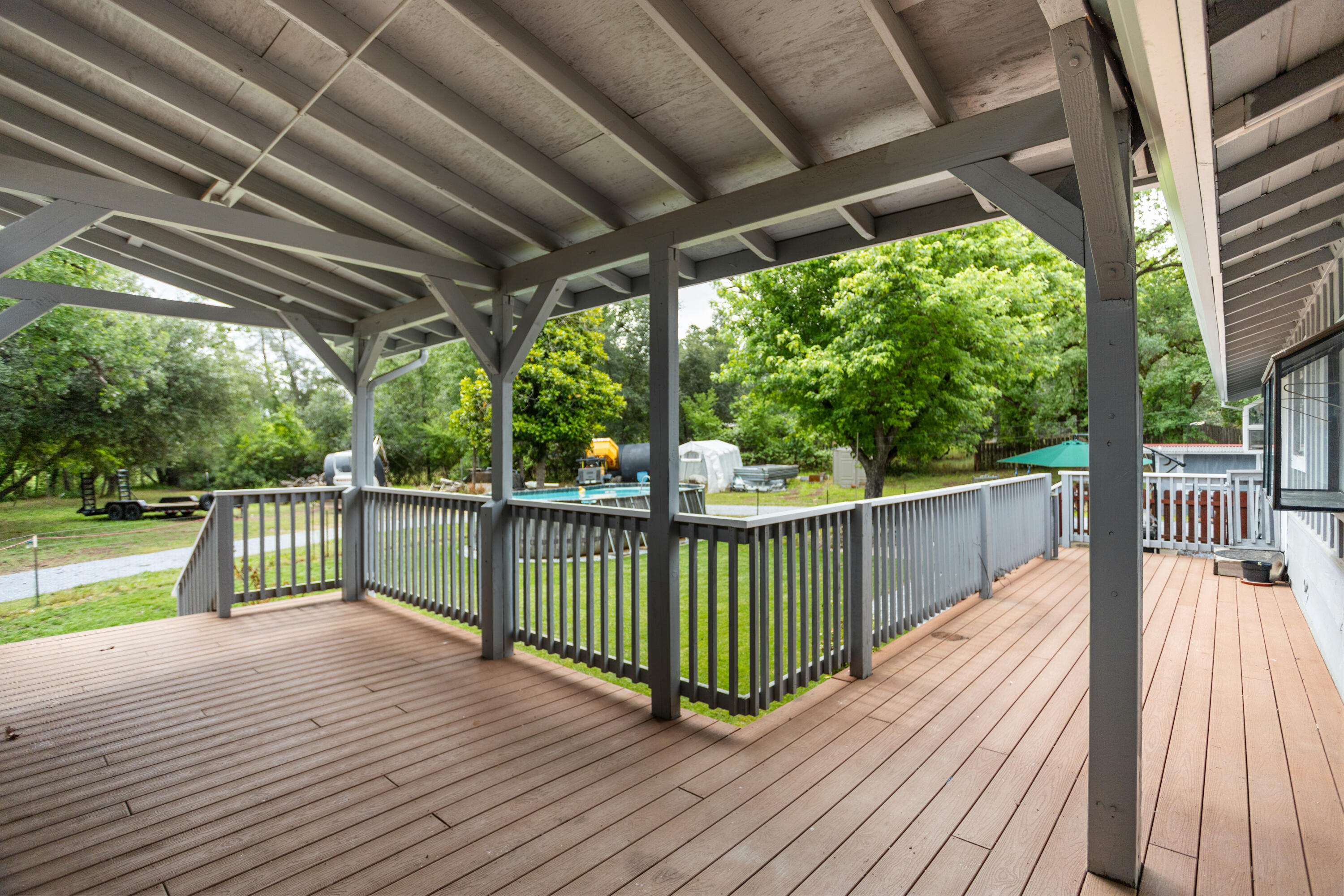 9891 Harley Leighton Road Redding, CA 96003 - Photo 12 of 52 a view of a balcony with wooden floor