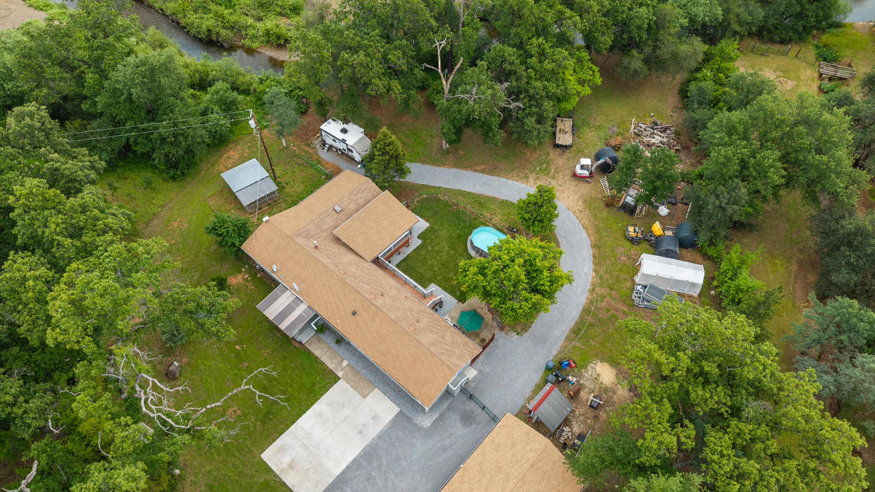 9891 Harley Leighton Road Redding, CA 96003 - Photo 3 of 52 an aerial view of a house with a yard basket ball court and outdoor seating