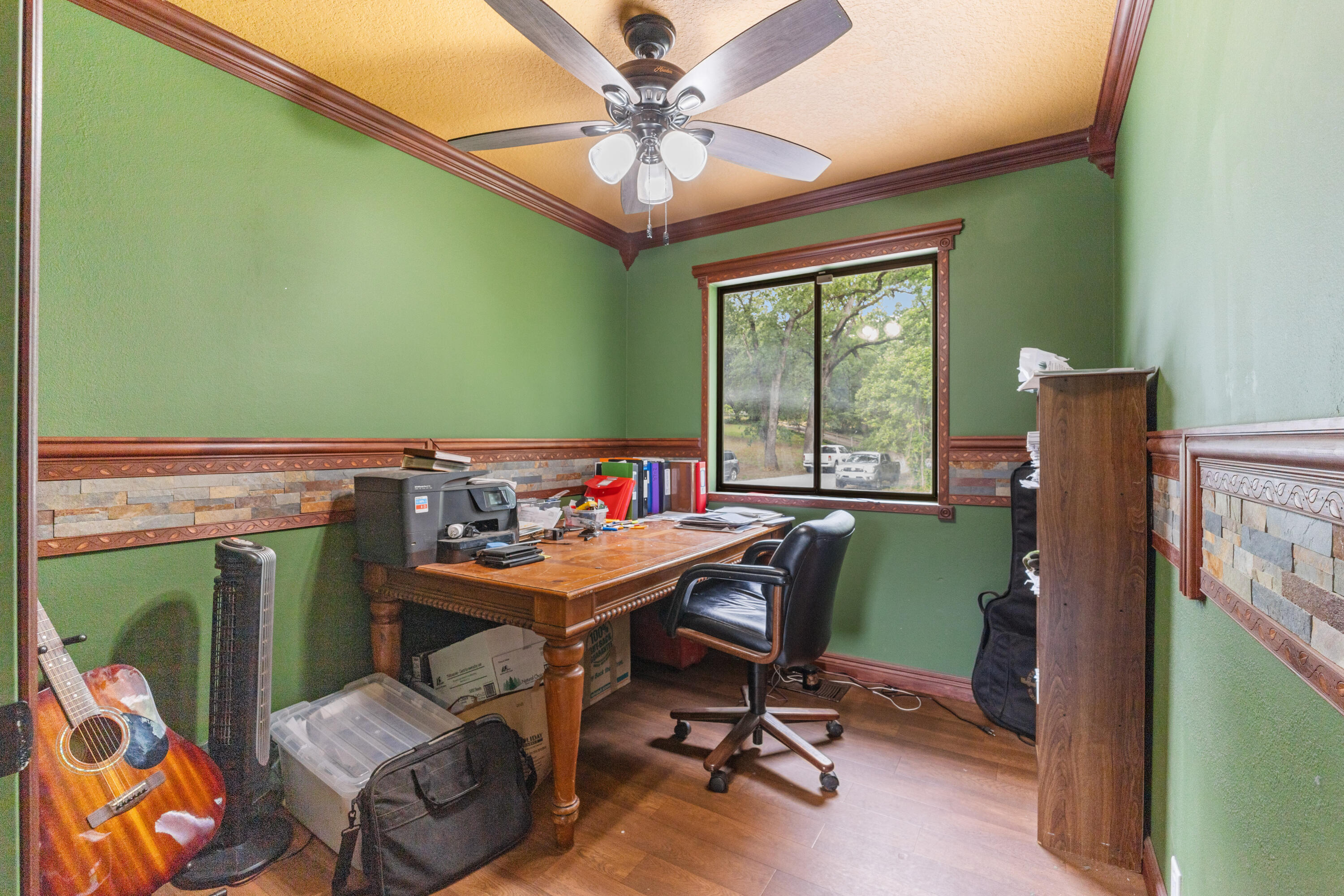 9891 Harley Leighton Road Redding, CA 96003 - Photo 36 of 52 a view of a workspace with furniture and a window