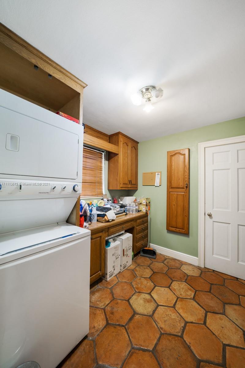1333 Blue Road Coral Gables, FL 33146 - Photo 14 of 25 a view of a storage & utility room with two washing machine