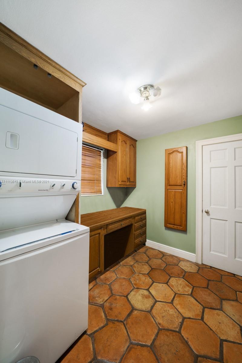 1333 Blue Road Coral Gables, FL 33146 - Photo 17 of 25 a room with a washer and dryer