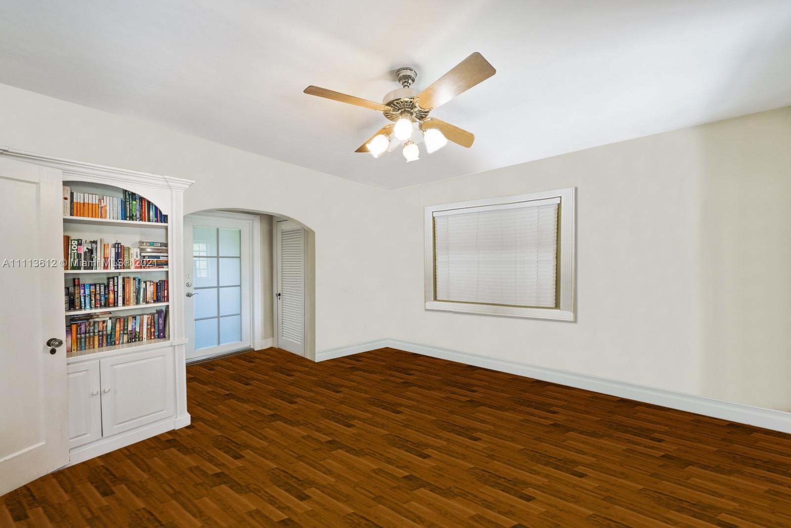 1333 Blue Road Coral Gables, FL 33146 - Photo 24 of 25 a bedroom with a bed and a window