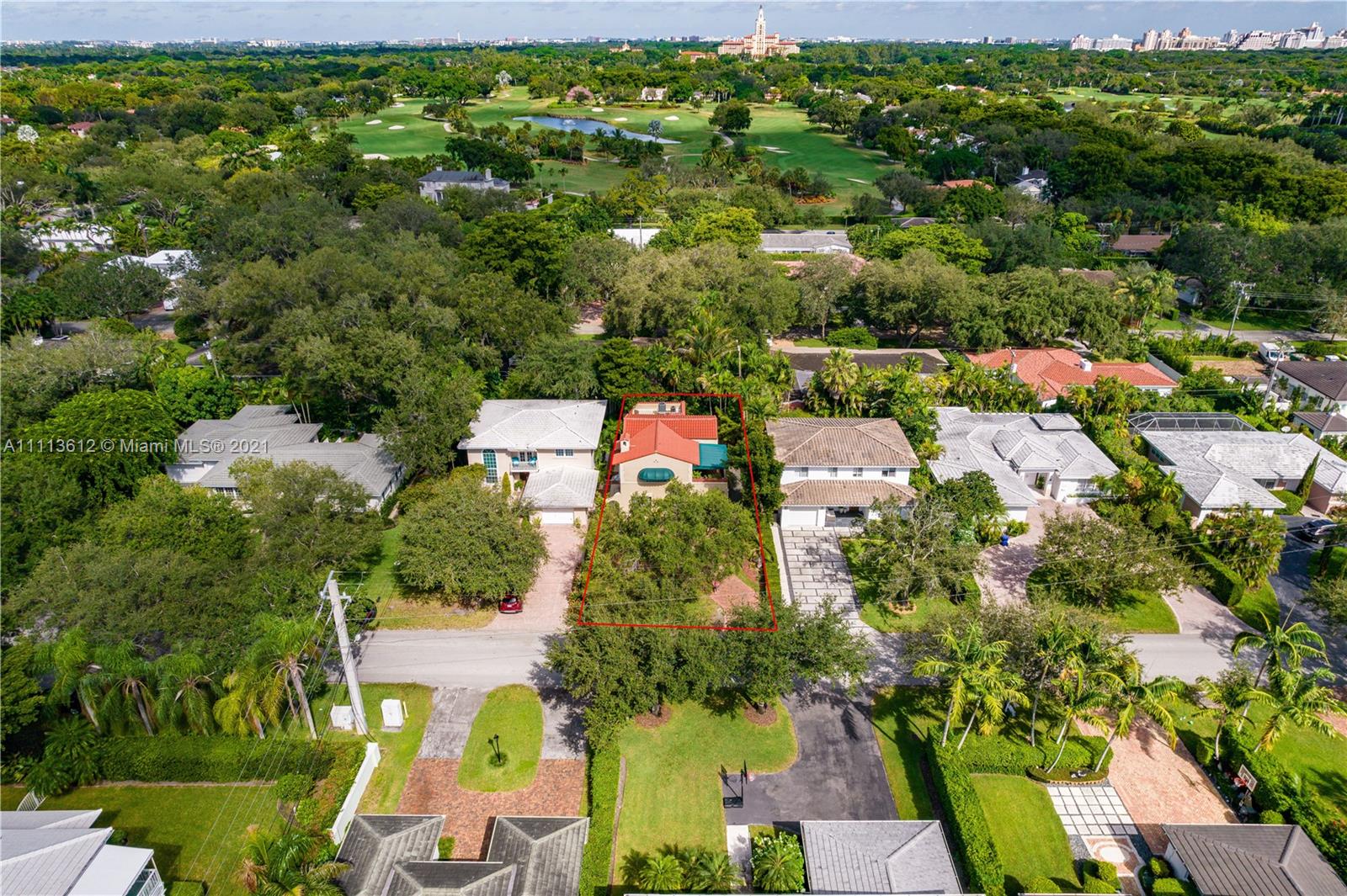 1333 Blue Road Coral Gables, FL 33146 - Photo 3 of 25 an aerial view of residential houses with outdoor space and trees all around