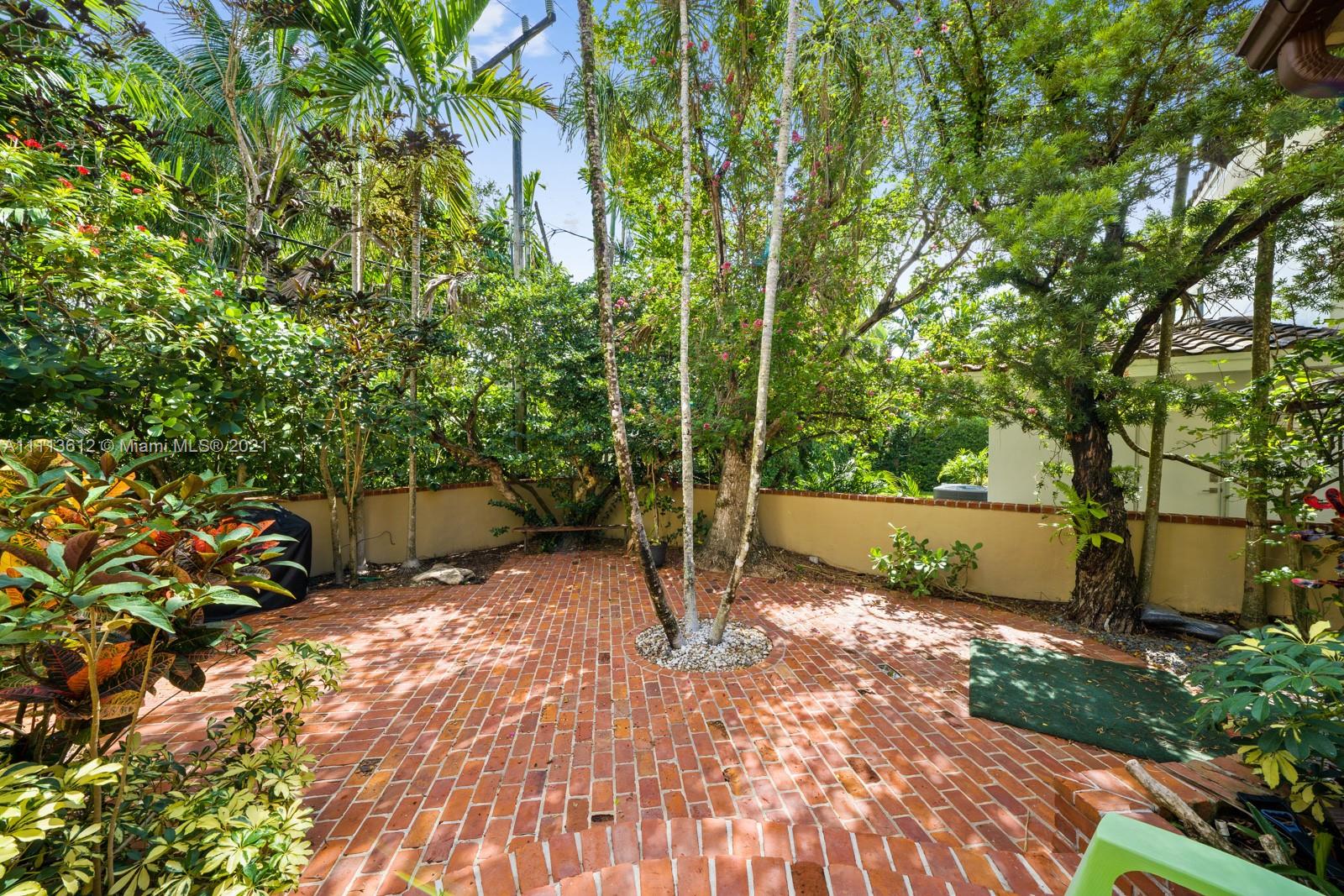 1333 Blue Road Coral Gables, FL 33146 - Photo 5 of 25 a view of a backyard