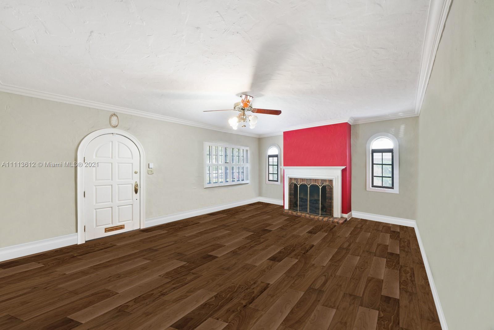 1333 Blue Road Coral Gables, FL 33146 - Photo 7 of 25 a view of a livingroom with a staircase