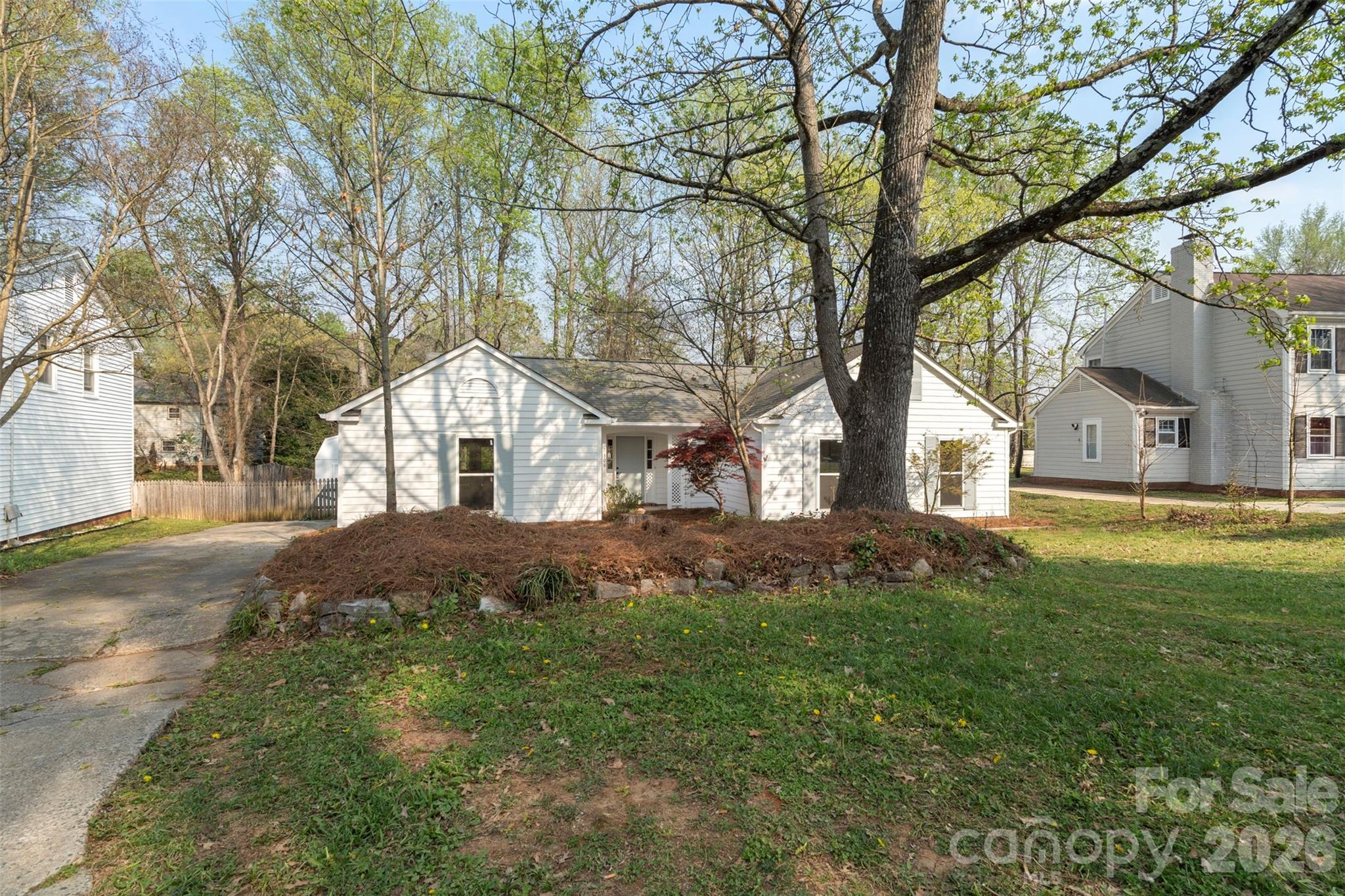 7308 Walterboro Road Charlotte, NC 28227 - Photo 2 of 43 a front view of house with yard and green space