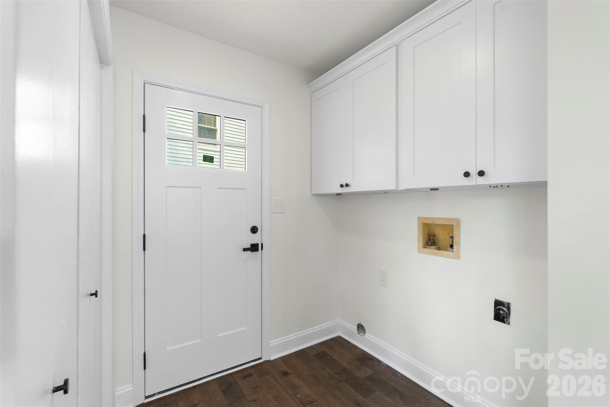 7308 Walterboro Road Charlotte, NC 28227 - Photo 21 of 43 a view of an empty room with wooden floor