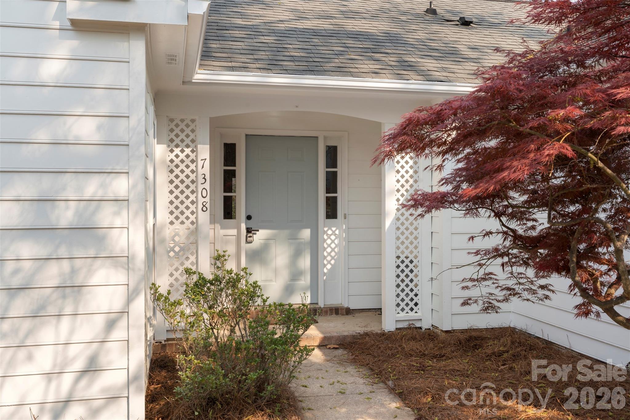 7308 Walterboro Road Charlotte, NC 28227 - Photo 6 of 43 a view of a house with a yard