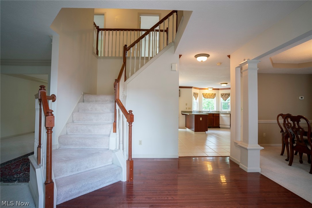 1380 Walnut Ridge Drive Uniontown, OH 44685 - Photo 8 of 35 Foyer entry with beautiful cherry wood floors!