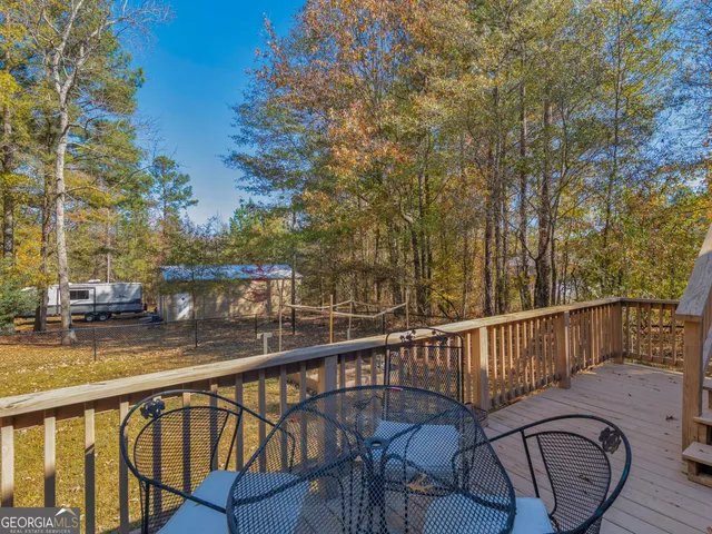 a view of balcony with furniture