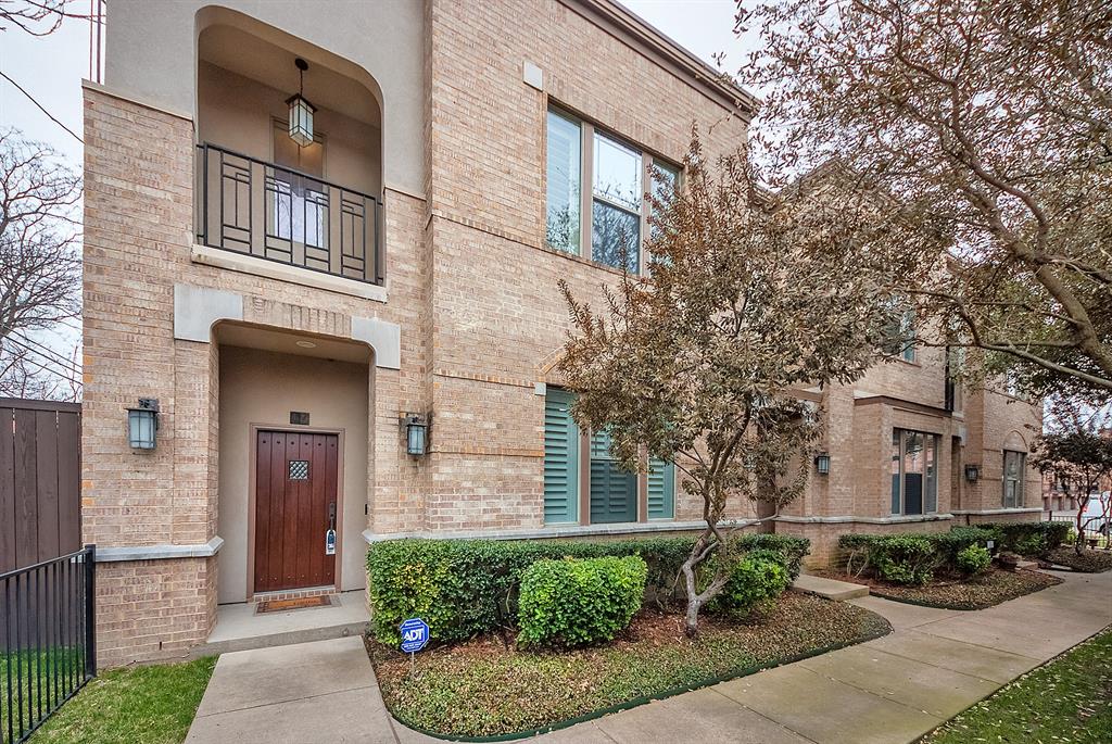 6269 Oram Street, Unit 16 Dallas, TX 75214 - Photo 1 of 1 a front view of a house with a yard