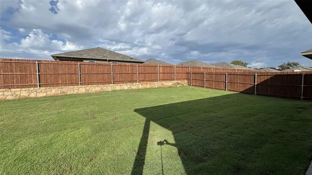 a picture of a room with an window