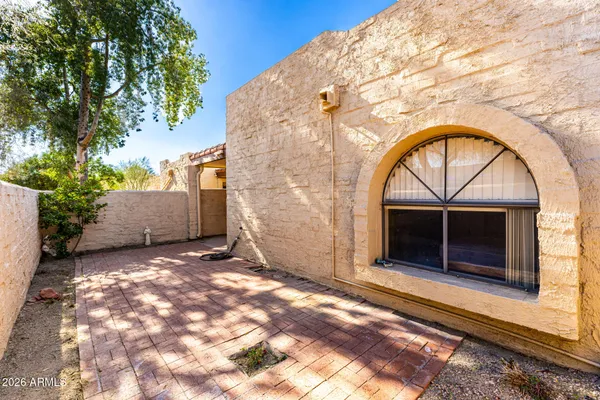 a view of entrance gate of a house