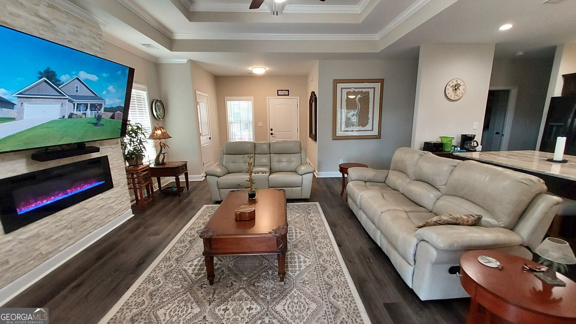 107 Lighterknot Trail Perry, GA 31069 - Photo 3 of 22 a living room with furniture and a flat screen tv