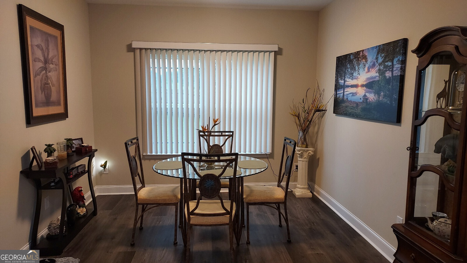 107 Lighterknot Trail Perry, GA 31069 - Photo 9 of 22 a view of a dining room with furniture and wooden floor