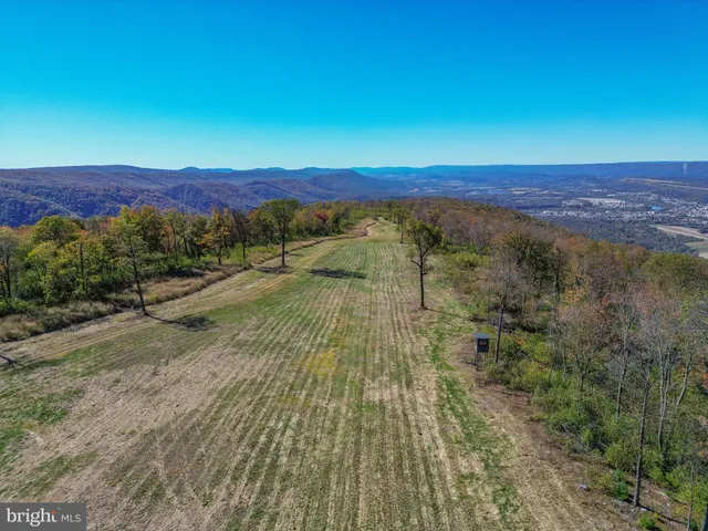 a view of an outdoor space with mountain view