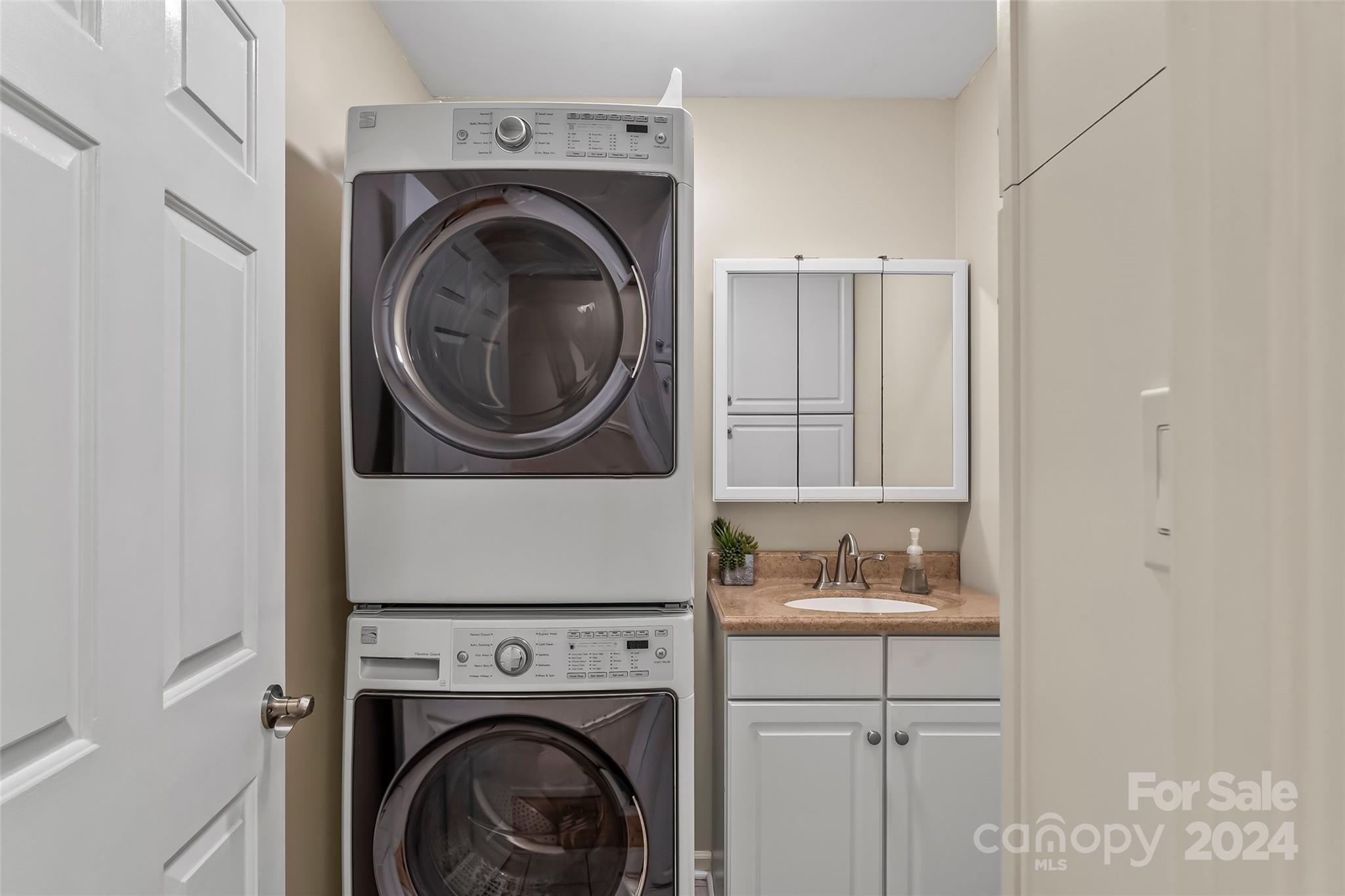 203 Lost Corner Road Morganton, NC 28655 - Photo 18 of 47 a close up view of a washer and dryer