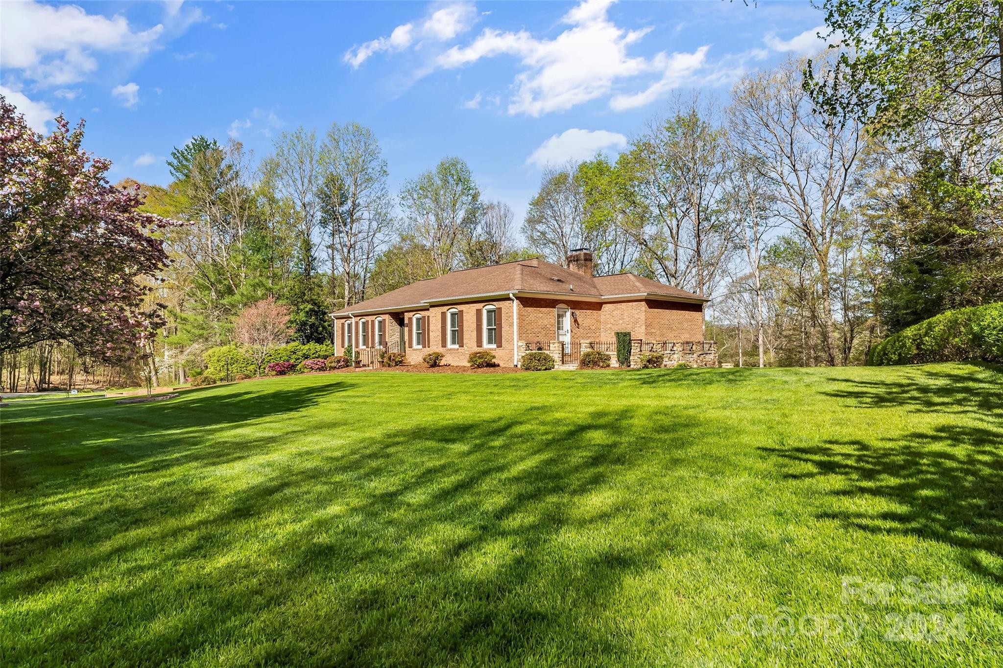 203 Lost Corner Road Morganton, NC 28655 - Photo 2 of 47 a front view of house with yard and trees