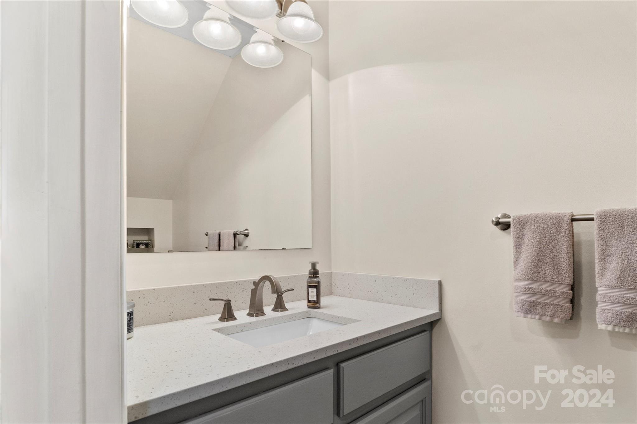 203 Lost Corner Road Morganton, NC 28655 - Photo 28 of 47 a bathroom with a sink and a mirror