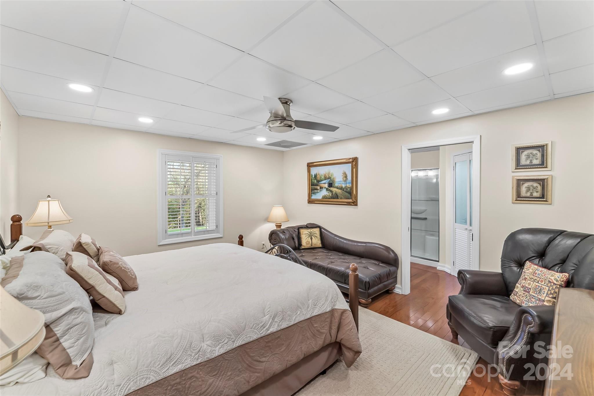 203 Lost Corner Road Morganton, NC 28655 - Photo 32 of 47 a bedroom with a bed and wooden floor