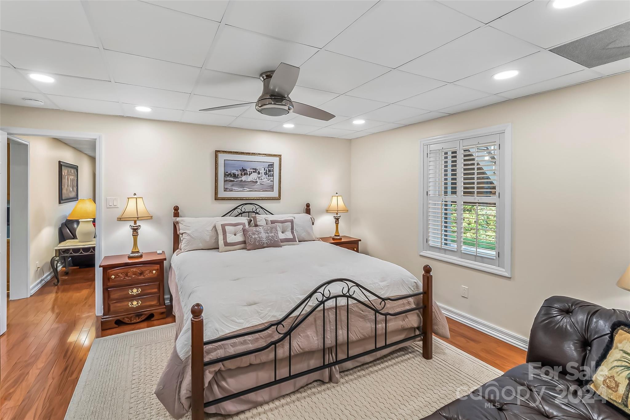 203 Lost Corner Road Morganton, NC 28655 - Photo 33 of 47 a spacious bedroom with a bed a couch and dresser