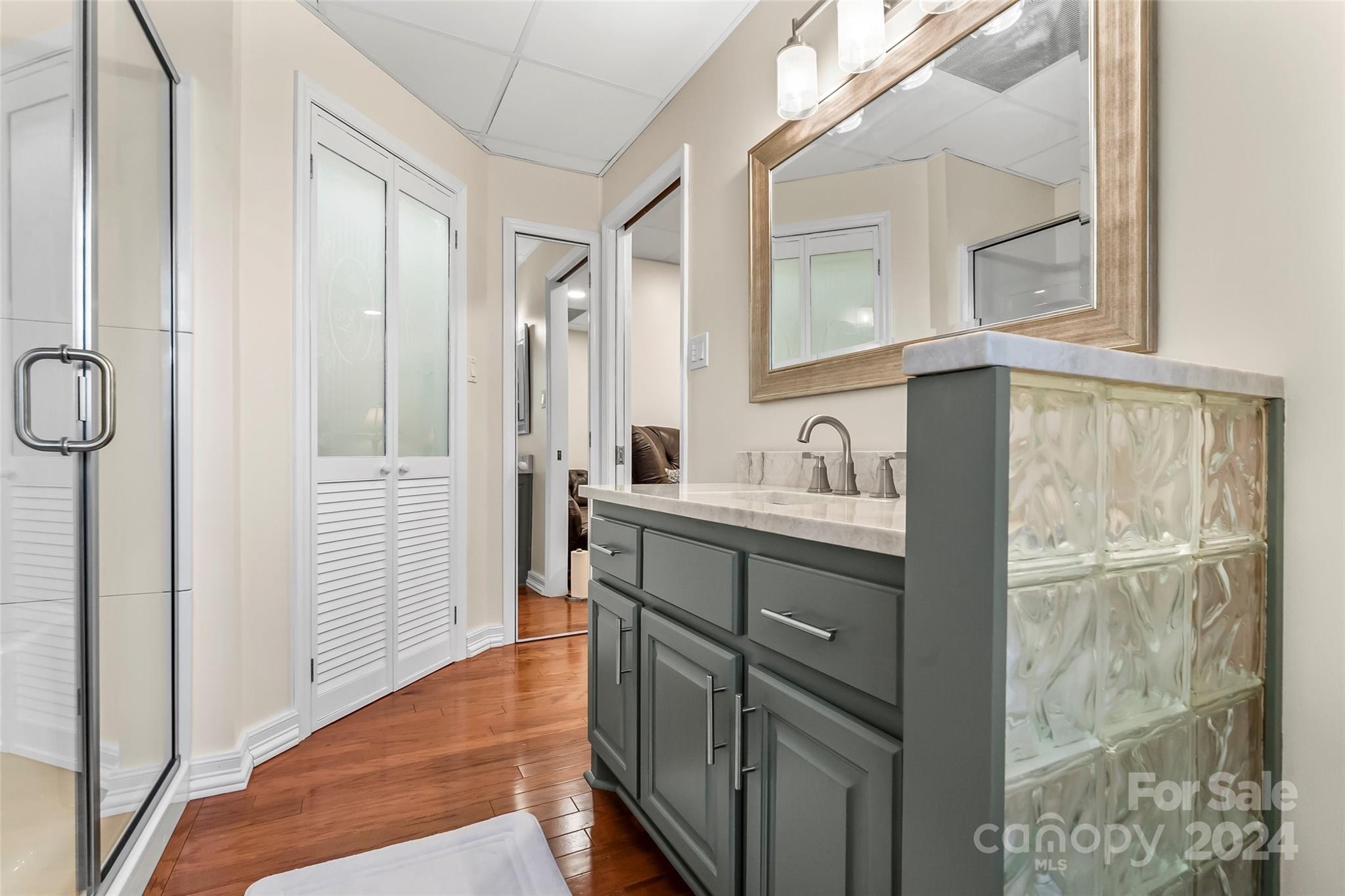 203 Lost Corner Road Morganton, NC 28655 - Photo 35 of 47 a bathroom with a sink and a mirror