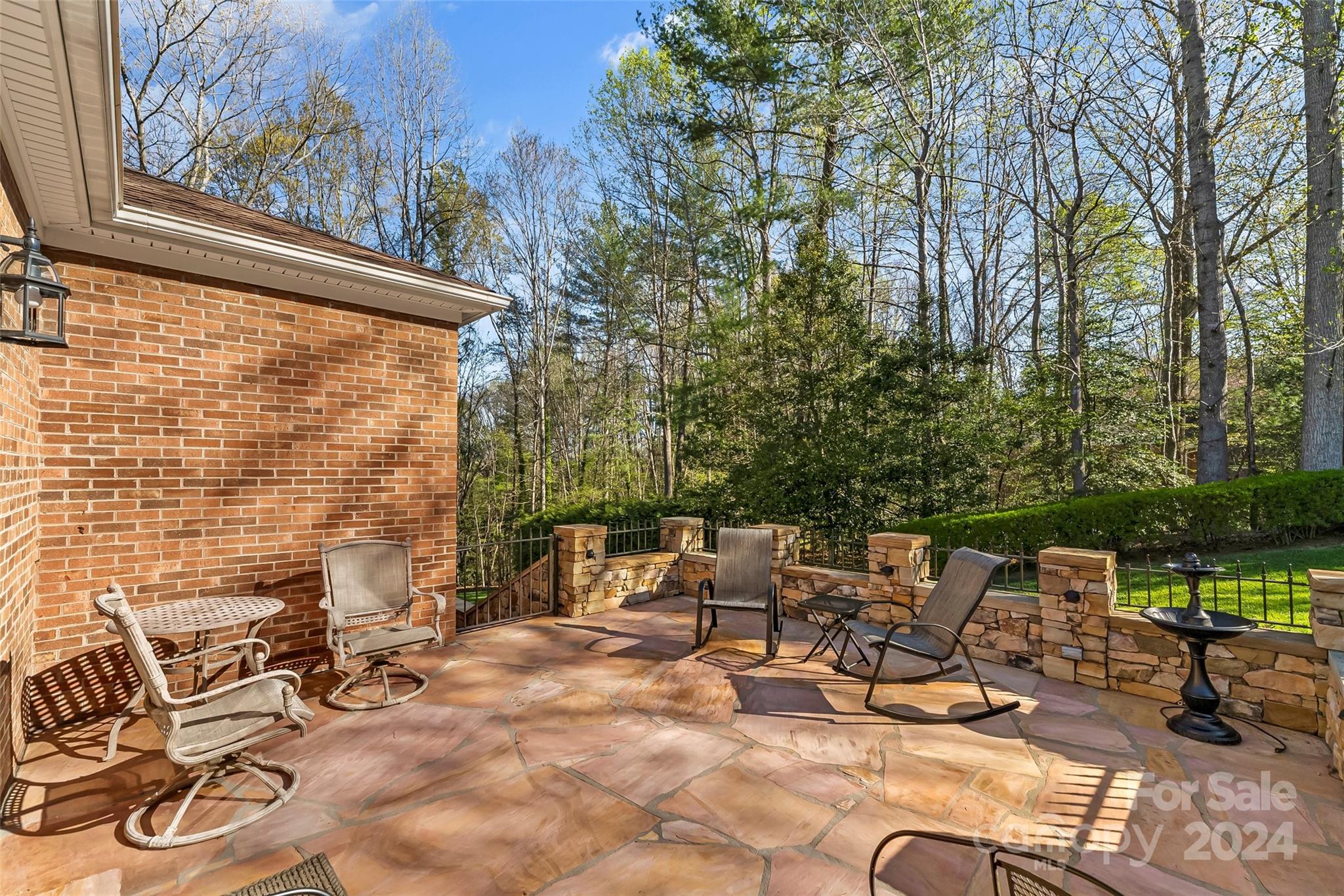 203 Lost Corner Road Morganton, NC 28655 - Photo 39 of 47 a view of backyard with a table and chairs