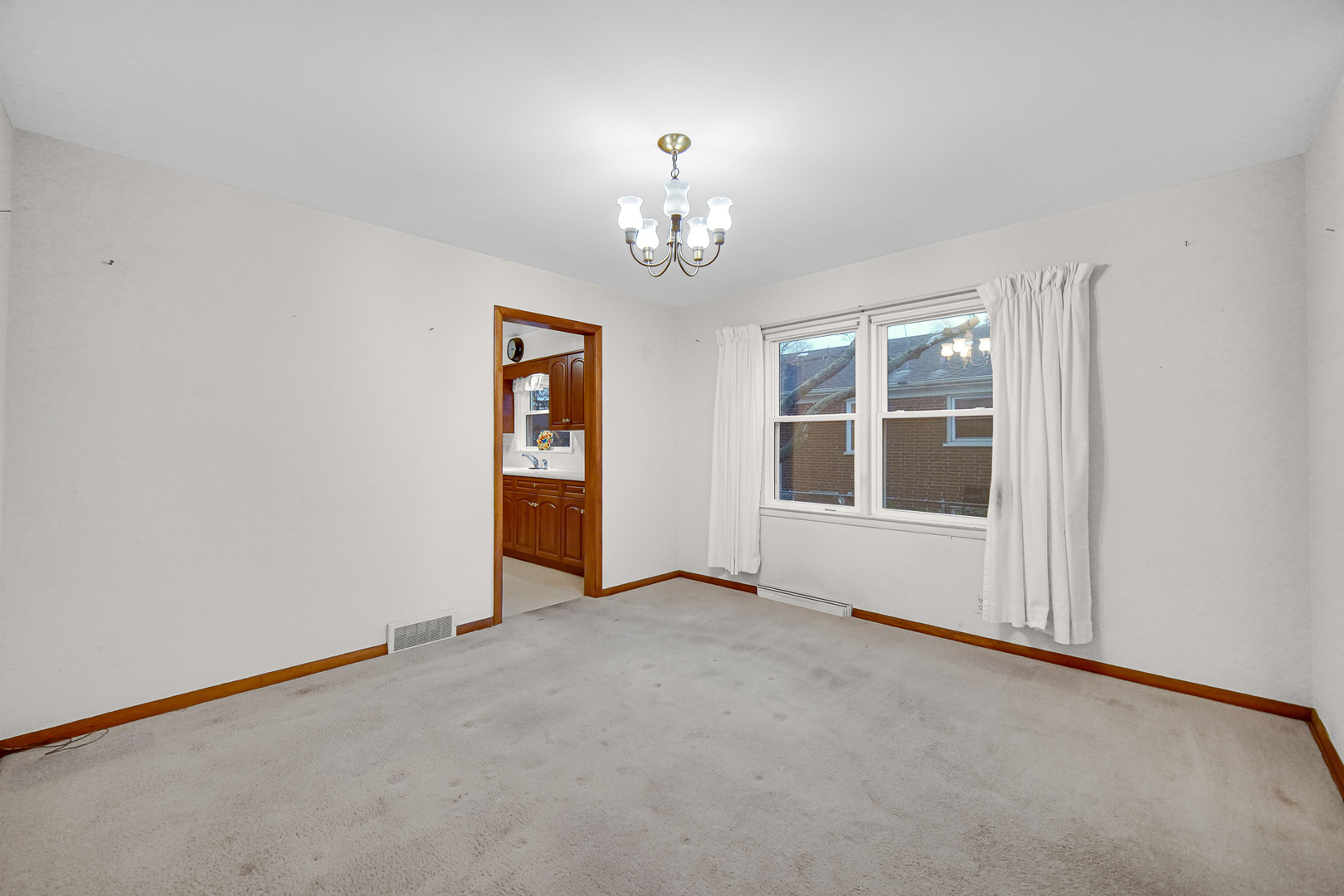 18423 Homewood Avenue Homewood, IL 60430 - Photo 12 of 27 an empty room with windows