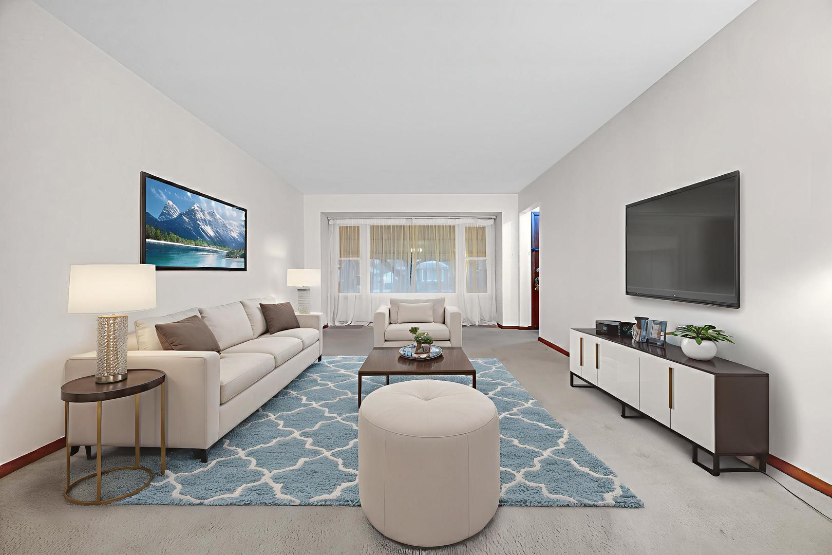 18423 Homewood Avenue Homewood, IL 60430 - Photo 9 of 27 a living room with furniture and a flat screen tv