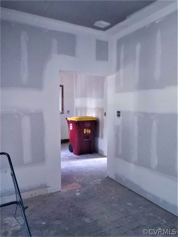 840 Commerce Street Petersburg, VA 23803 - Photo 16 of 38 a view of a room with water heater and racks
