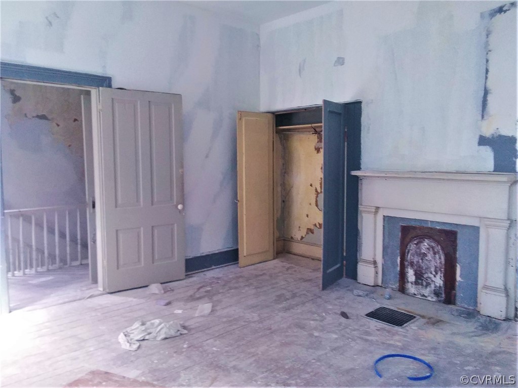 840 Commerce Street Petersburg, VA 23803 - Photo 29 of 38 a view of an empty room with a fireplace