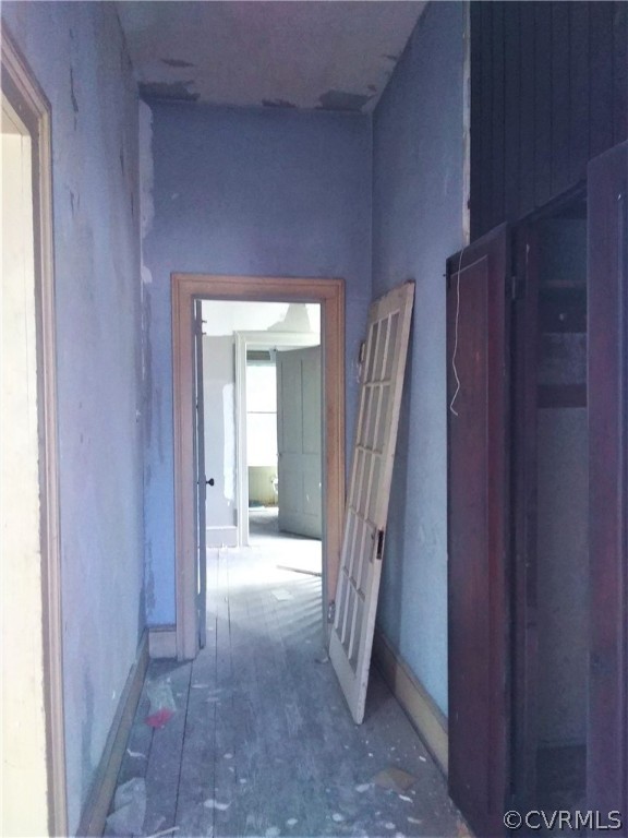 840 Commerce Street Petersburg, VA 23803 - Photo 36 of 38 a view of a hallway with entryway and stairs