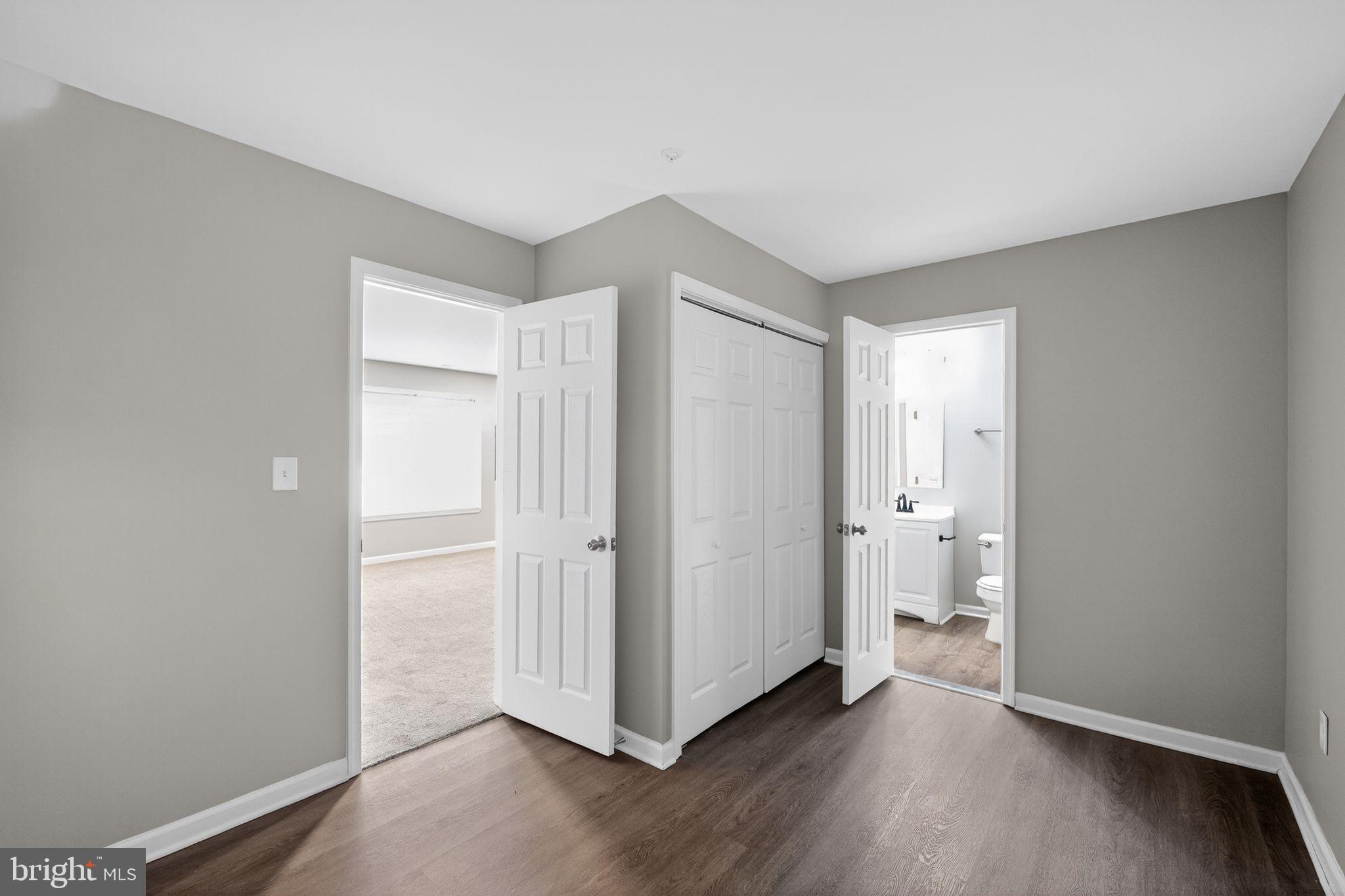 3524 Orchard Shade Road Randallstown, MD 21133 - Photo 16 of 34 a view of a room with wooden floor