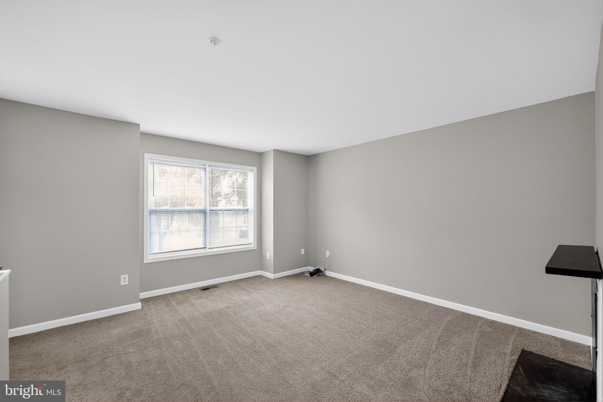 3524 Orchard Shade Road Randallstown, MD 21133 - Photo 17 of 34 an empty room with windows
