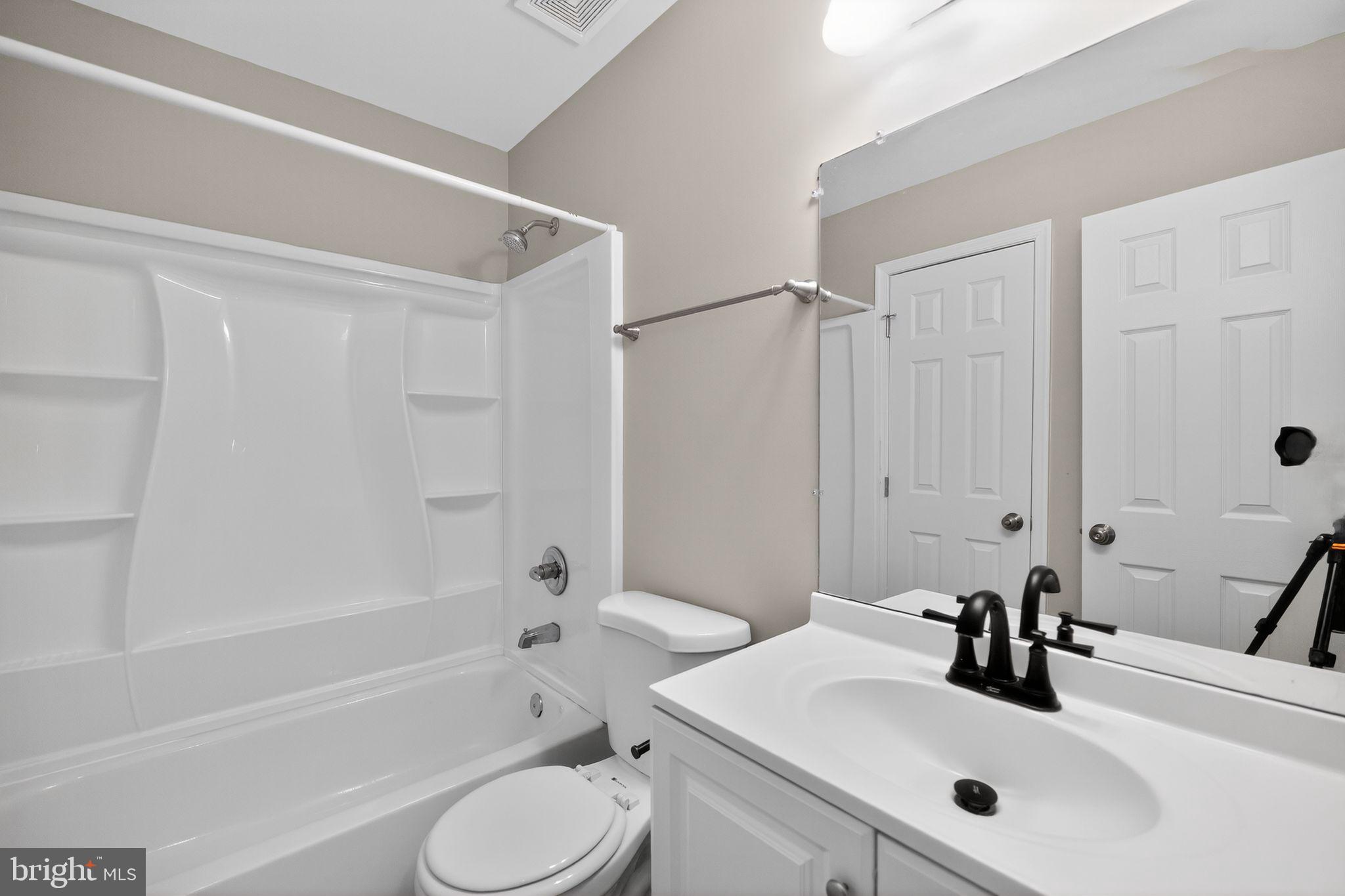 3524 Orchard Shade Road Randallstown, MD 21133 - Photo 19 of 34 a bathroom with a sink toilet and shower