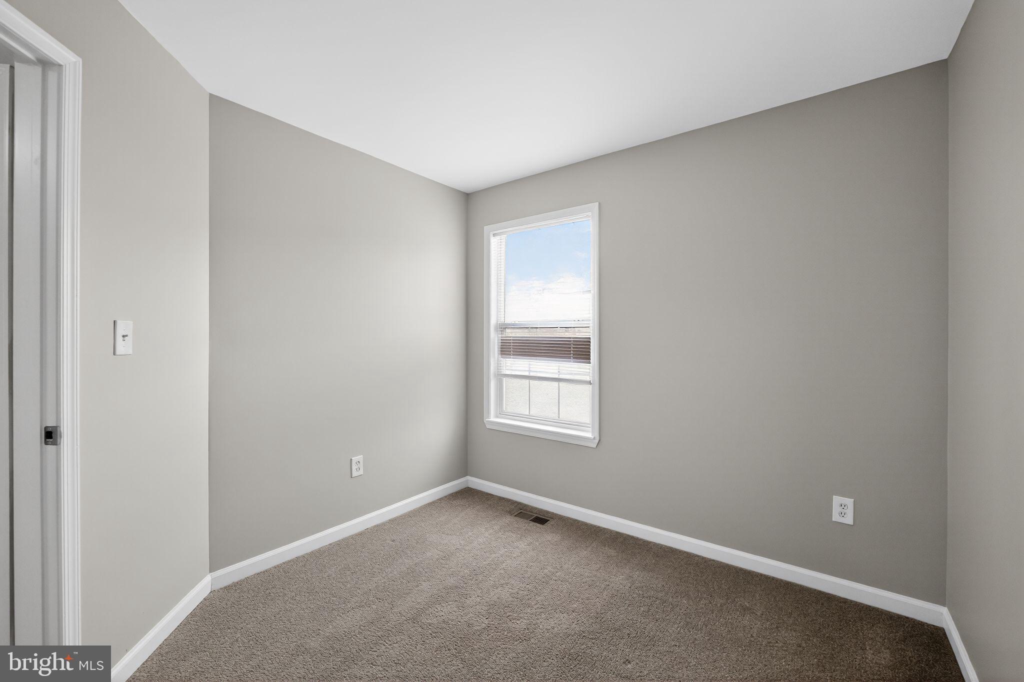 3524 Orchard Shade Road Randallstown, MD 21133 - Photo 20 of 34 an empty room with windows