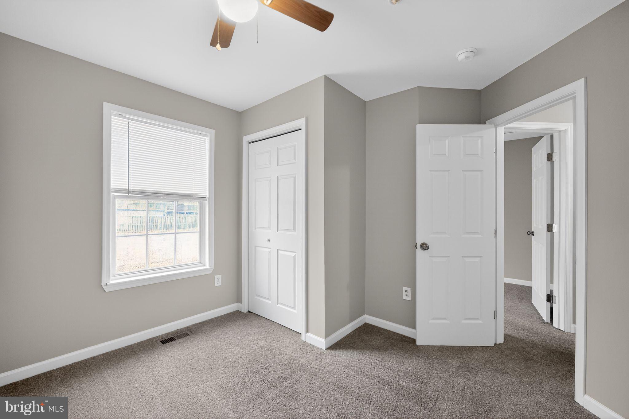 3524 Orchard Shade Road Randallstown, MD 21133 - Photo 24 of 34 a view of an empty room with a window