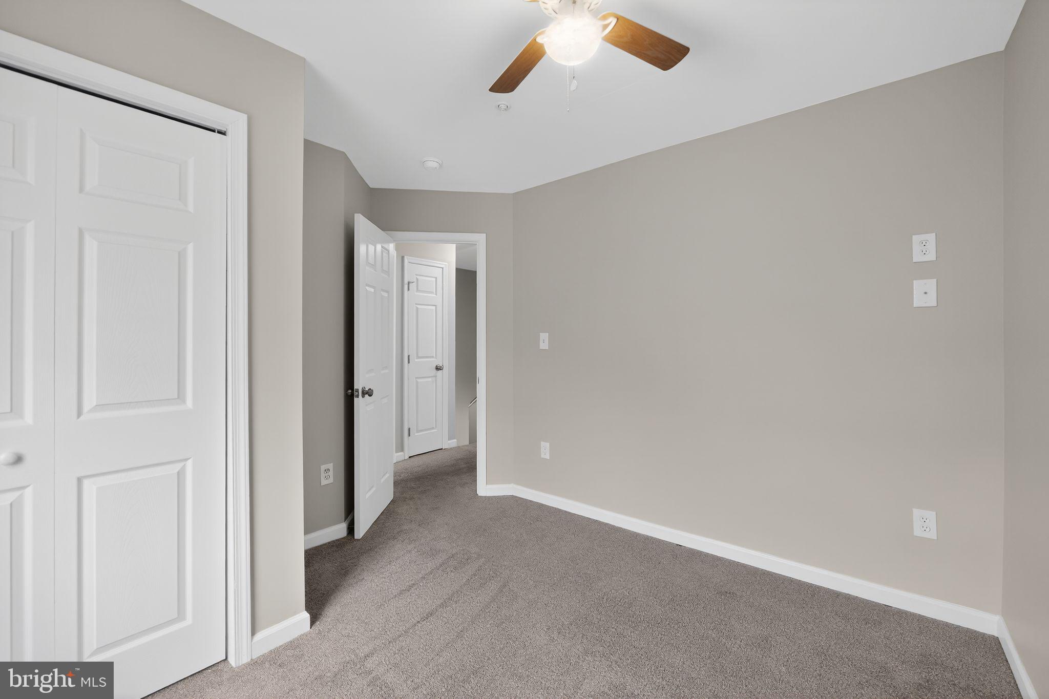 3524 Orchard Shade Road Randallstown, MD 21133 - Photo 25 of 34 an empty room with windows and closet