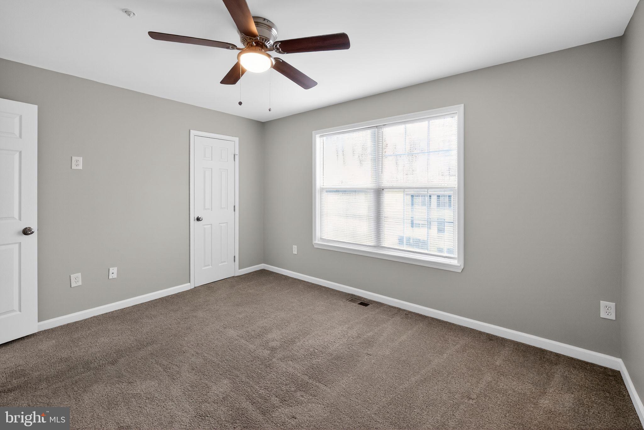 3524 Orchard Shade Road Randallstown, MD 21133 - Photo 28 of 34 a view of an empty room with a window