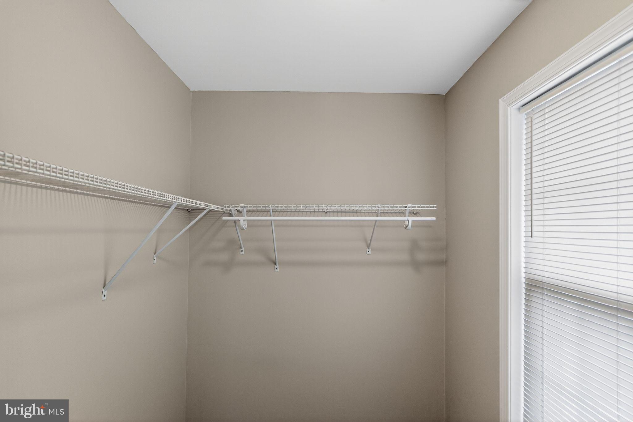 3524 Orchard Shade Road Randallstown, MD 21133 - Photo 30 of 34 a view of a room with racks on the wall