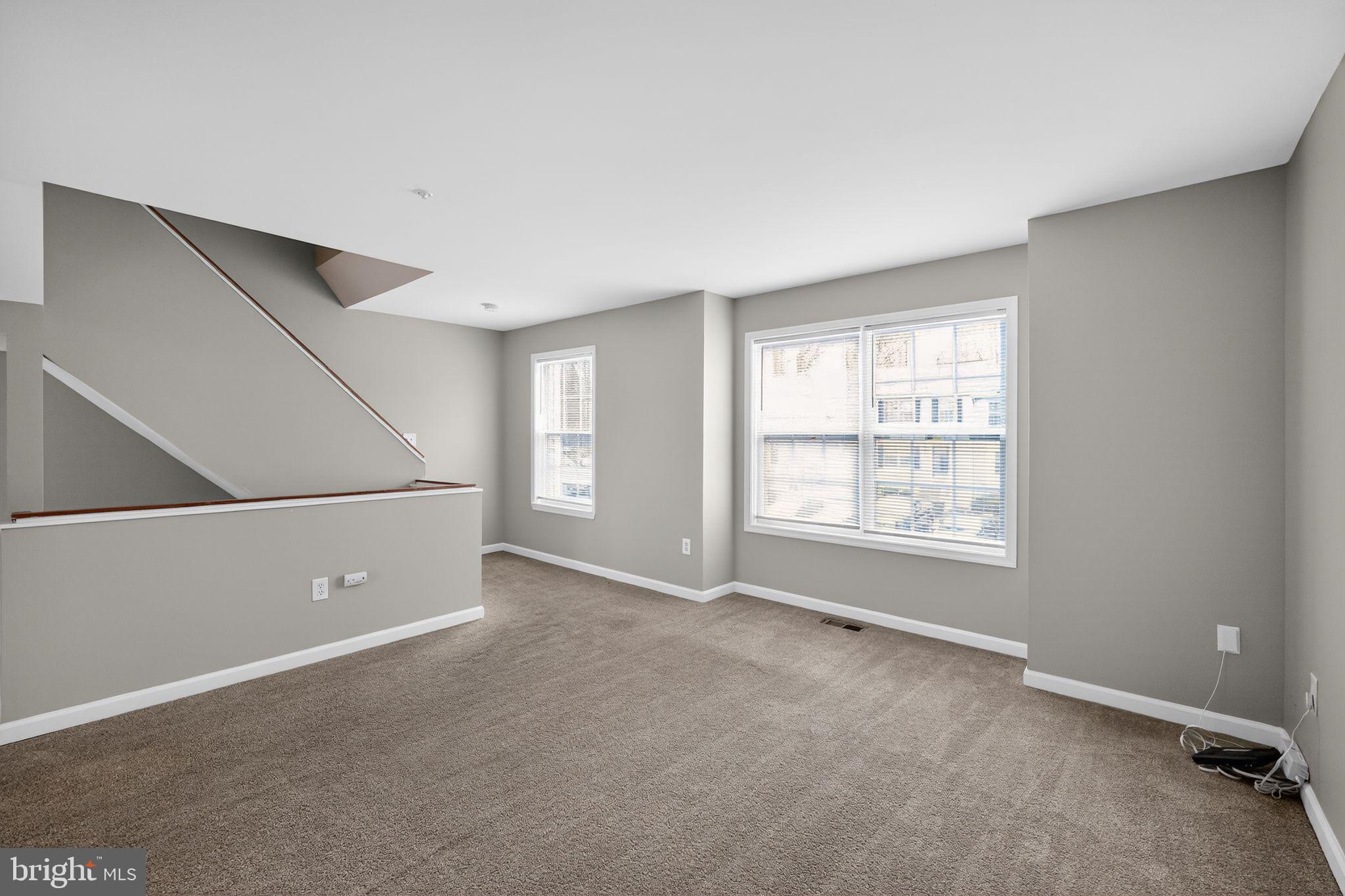 3524 Orchard Shade Road Randallstown, MD 21133 - Photo 31 of 34 an empty room with windows and closet