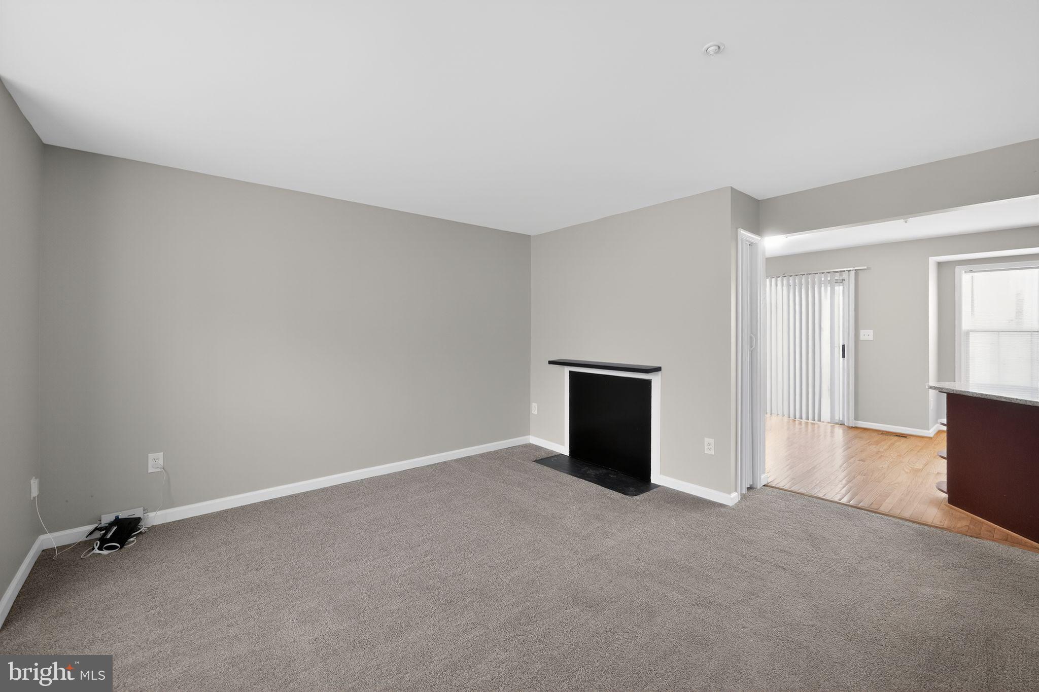 3524 Orchard Shade Road Randallstown, MD 21133 - Photo 4 of 34 an empty room with windows