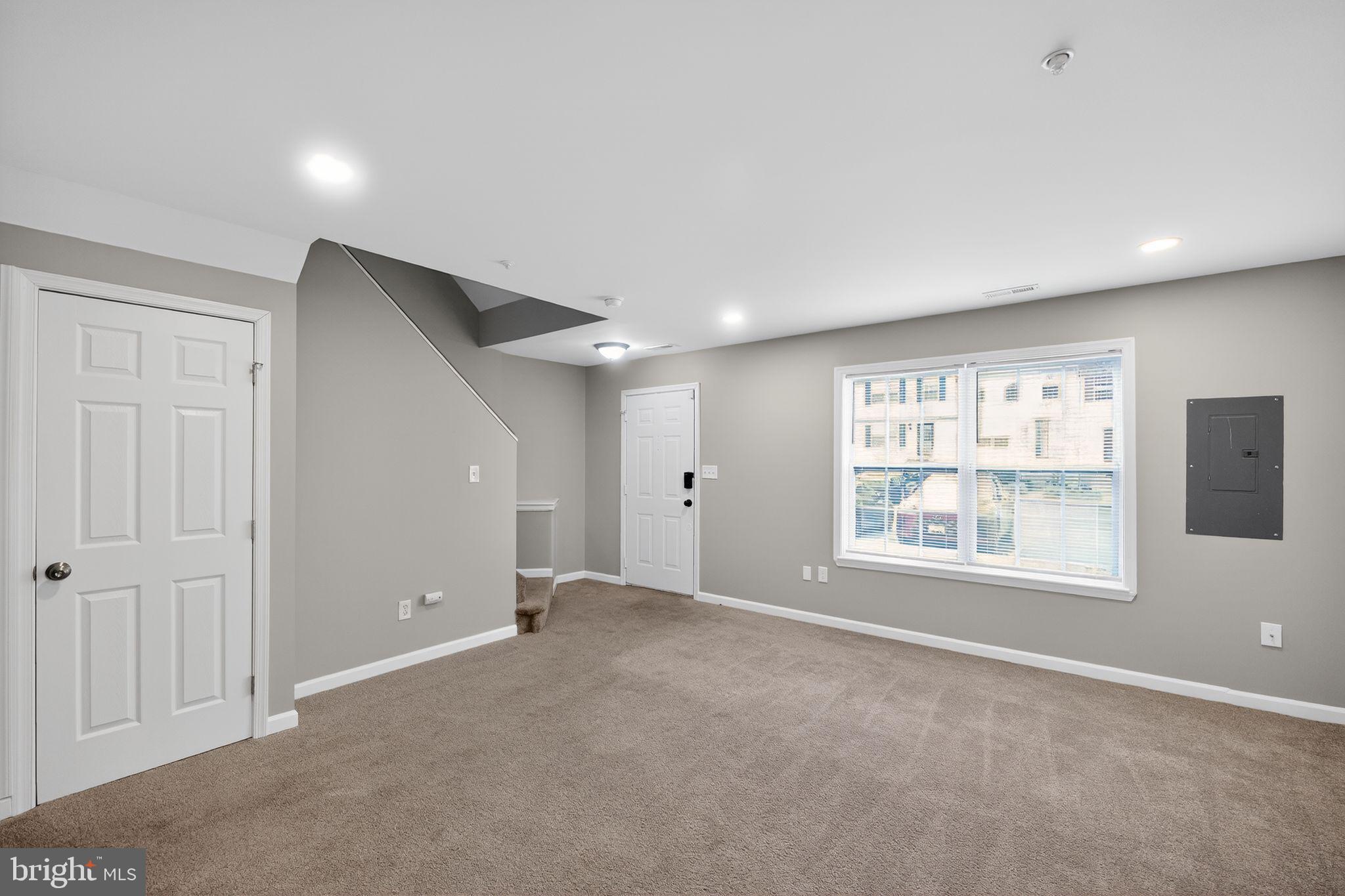 3524 Orchard Shade Road Randallstown, MD 21133 - Photo 5 of 34 a view of an empty room with a window